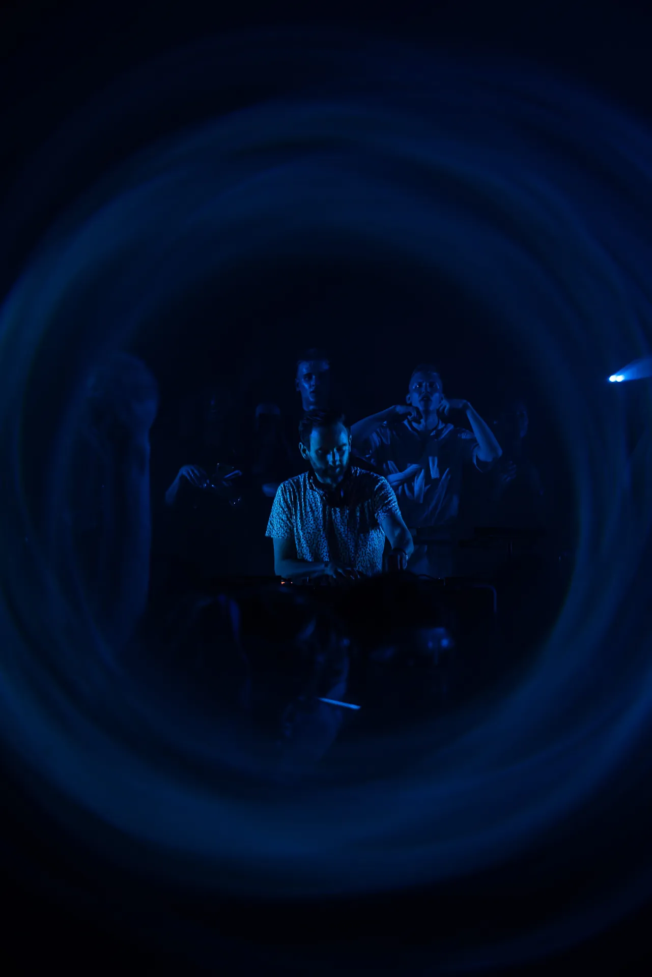 Musicians playing live at a concert, engaging with the audience and delivering an electrifying performance.